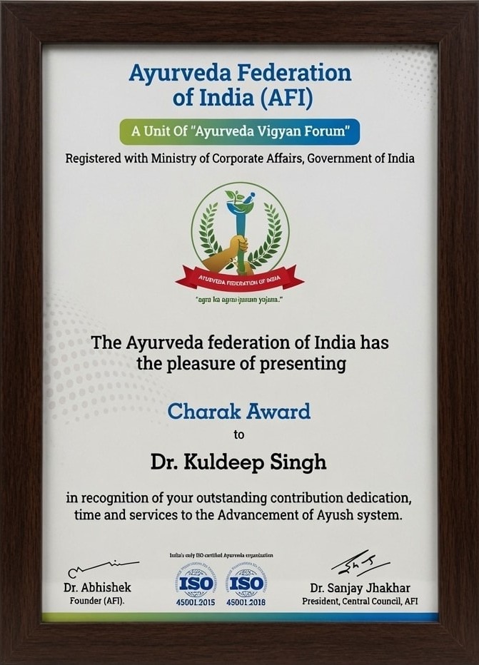 Charak Award from the Ayurveda Federation of India presented to Dr. Kuldeep Singh