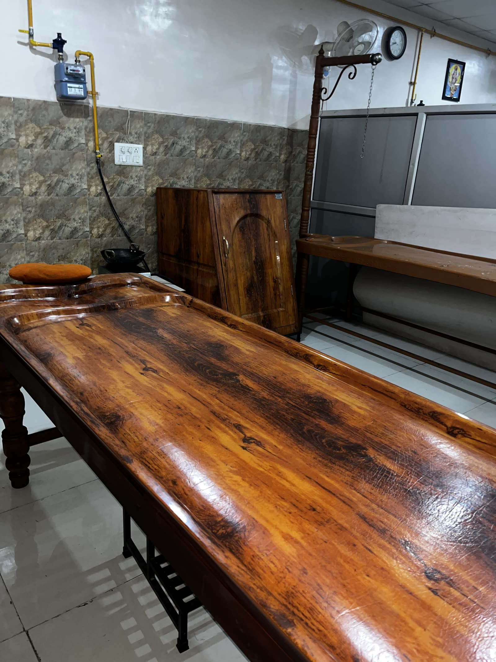 Therapy and recovery room with steam cabinet and treatment table