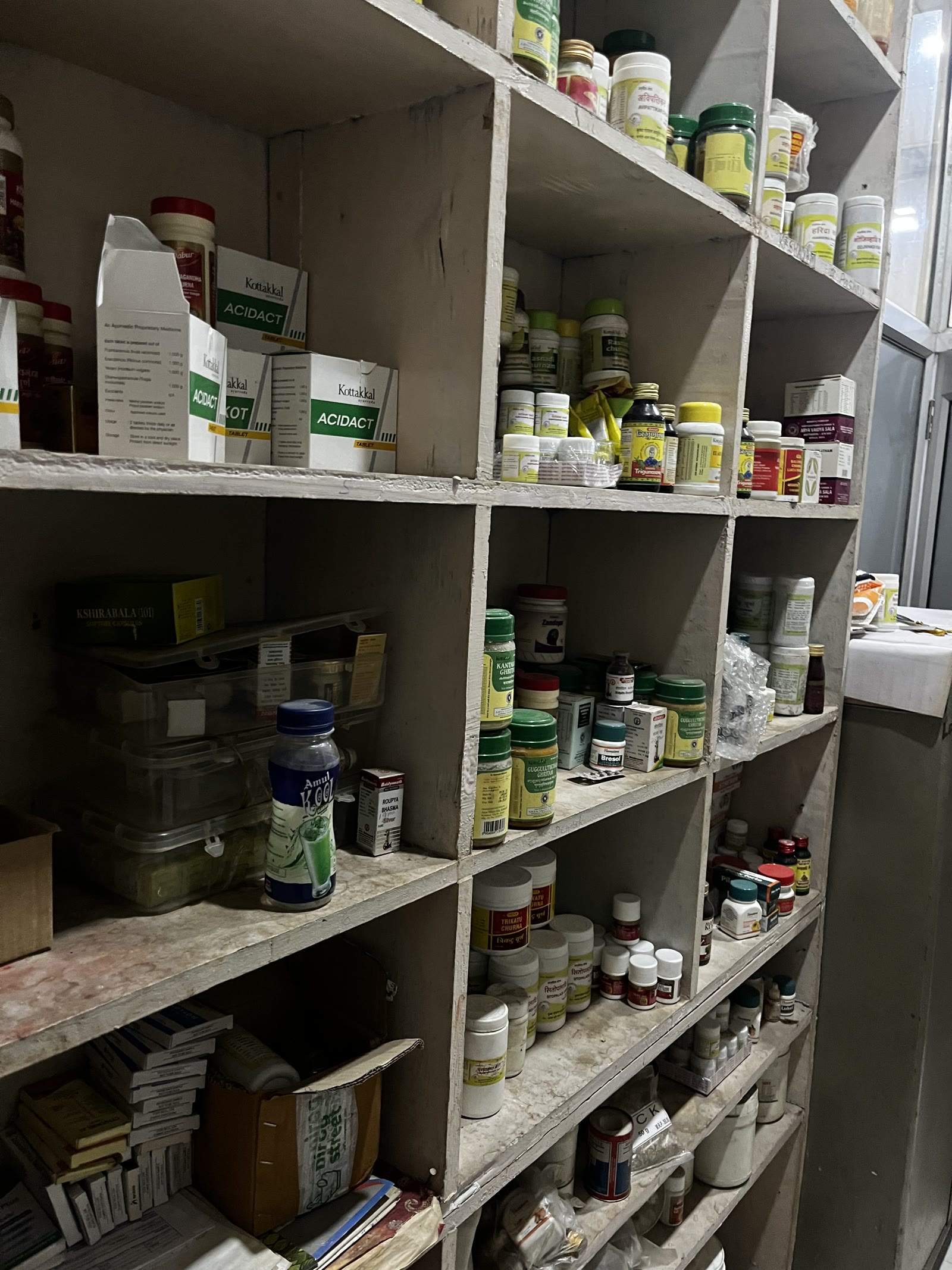 In-house Ayurvedic herbal pharmacy shelves